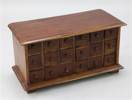 A modern mahogany nest of eight drawers, width 2ft 1in.
